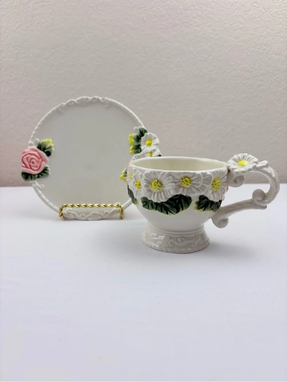 White Teacup & Saucer Featuring Ceramic Base, Raised White Daisies & Pink Roses